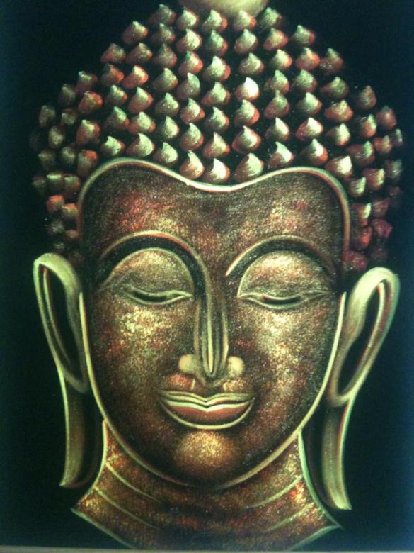 Yksi kankaalle maalatuista Buddha-tauluista, joka lähtee Suomeen